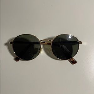 black tortoise round frame sunglasses